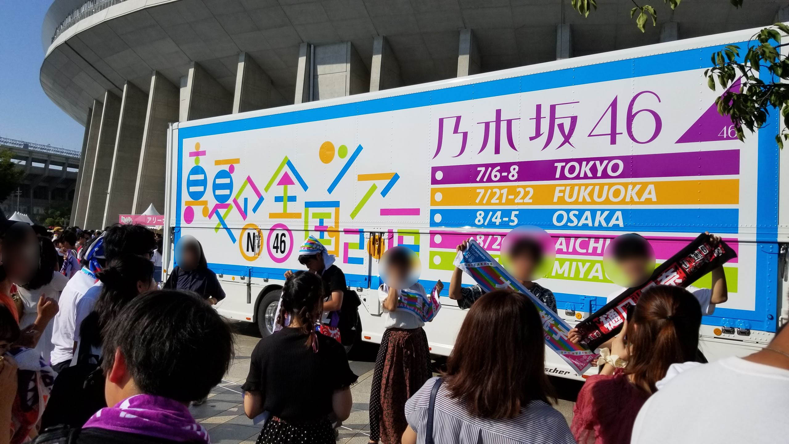Nogizaka46 tour truck outside a concert venue